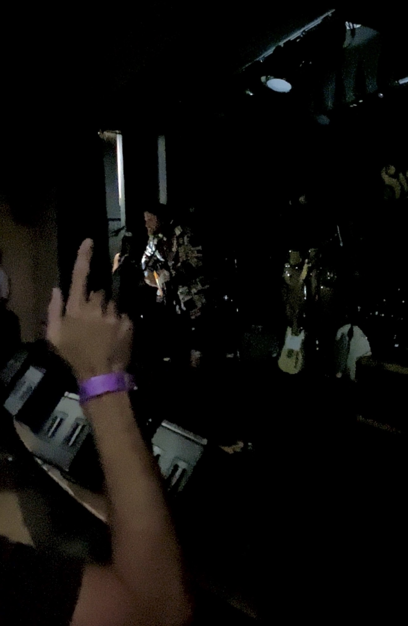 Lucas Nelson performing in the dark after a power outage